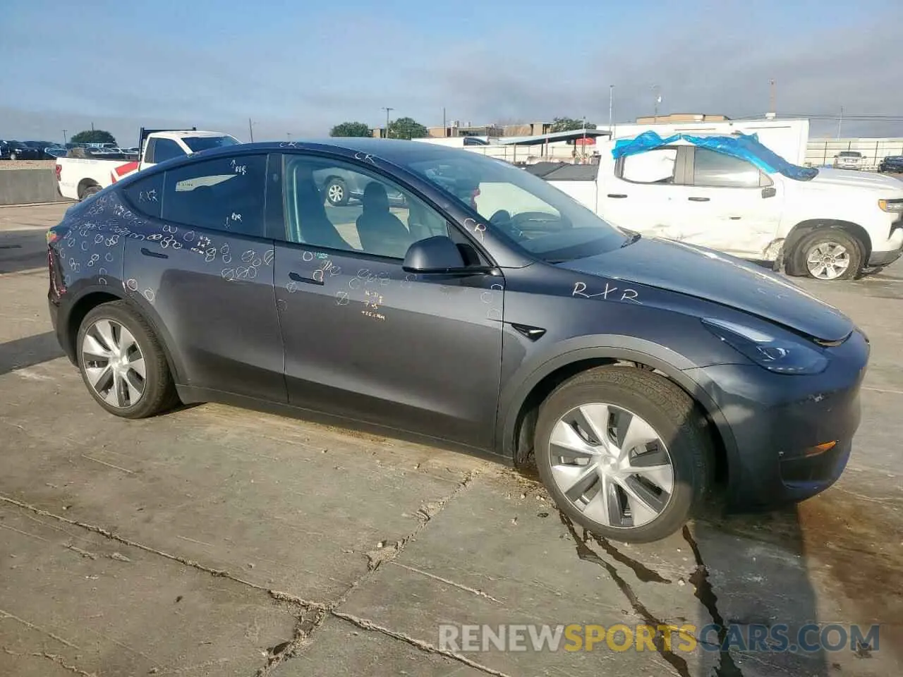 4 Photograph of a damaged car 7SAYGDED9PF962524 TESLA MODEL Y 2023