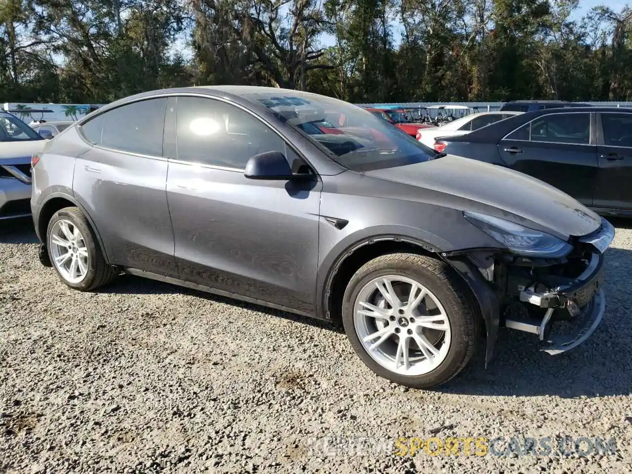 4 Photograph of a damaged car 7SAYGDEE0PA054372 TESLA MODEL Y 2023