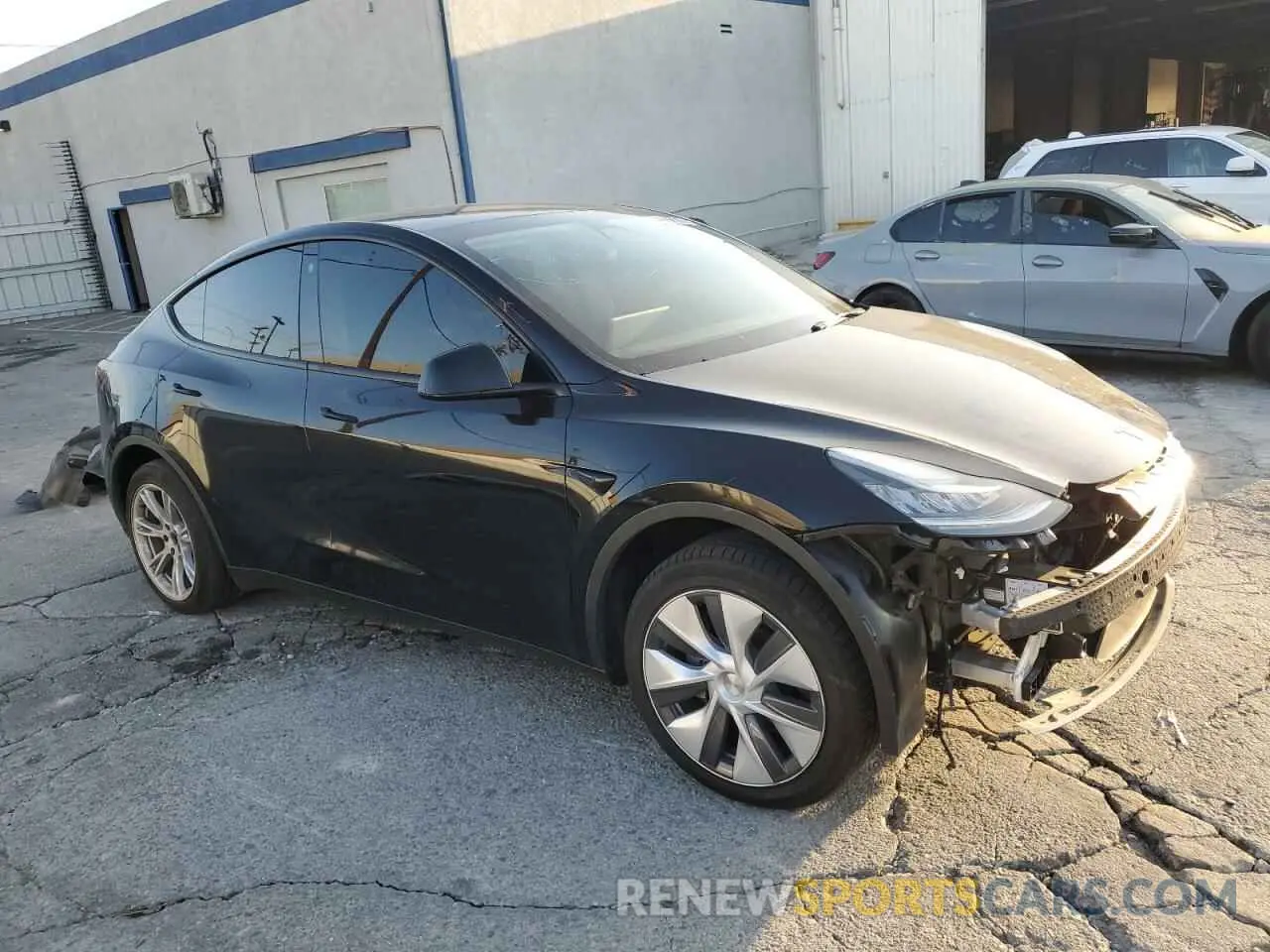 4 Photograph of a damaged car 7SAYGDEE0PA114201 TESLA MODEL Y 2023