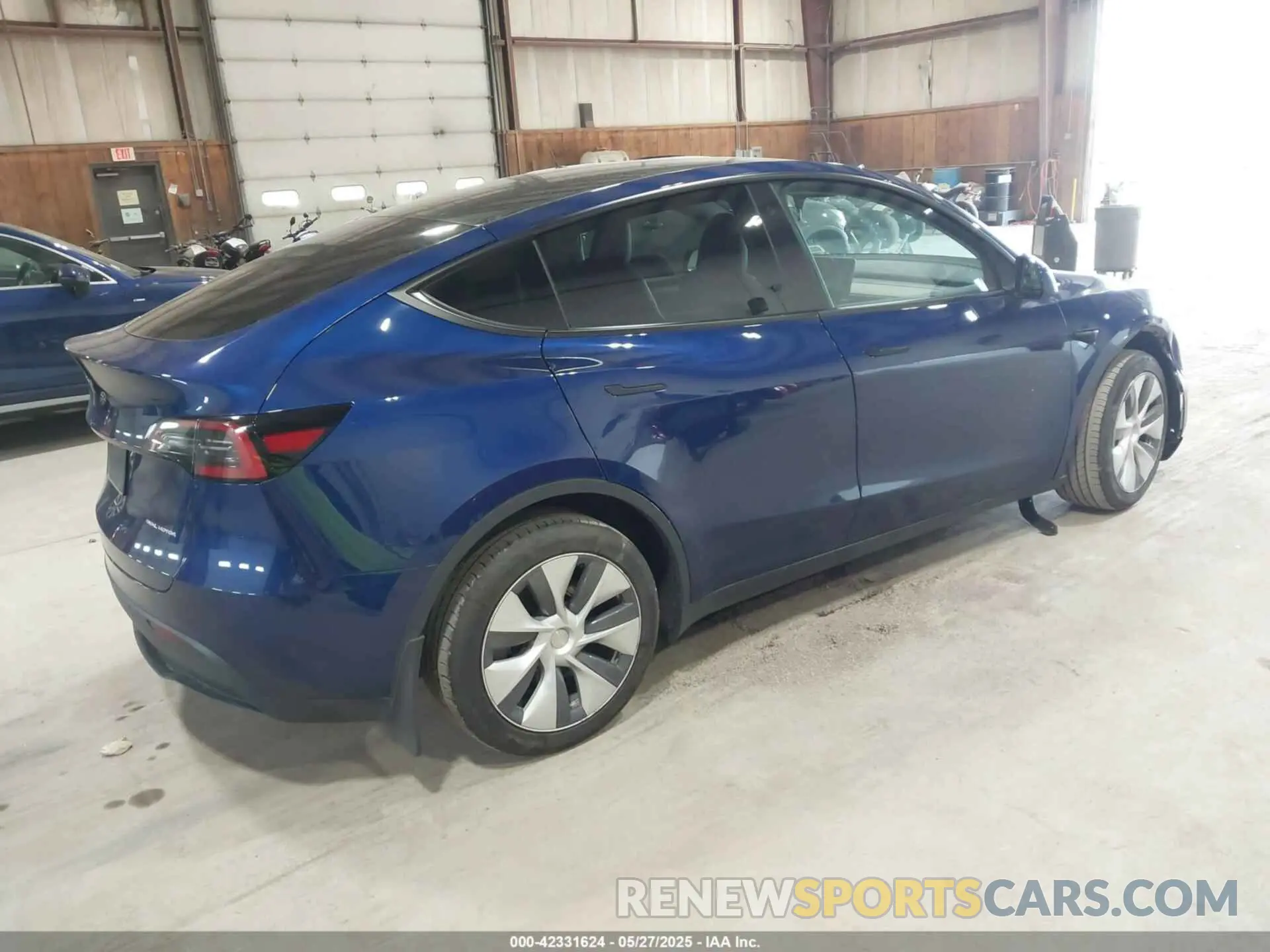4 Photograph of a damaged car 7SAYGDEE0PA124551 TESLA MODEL Y 2023