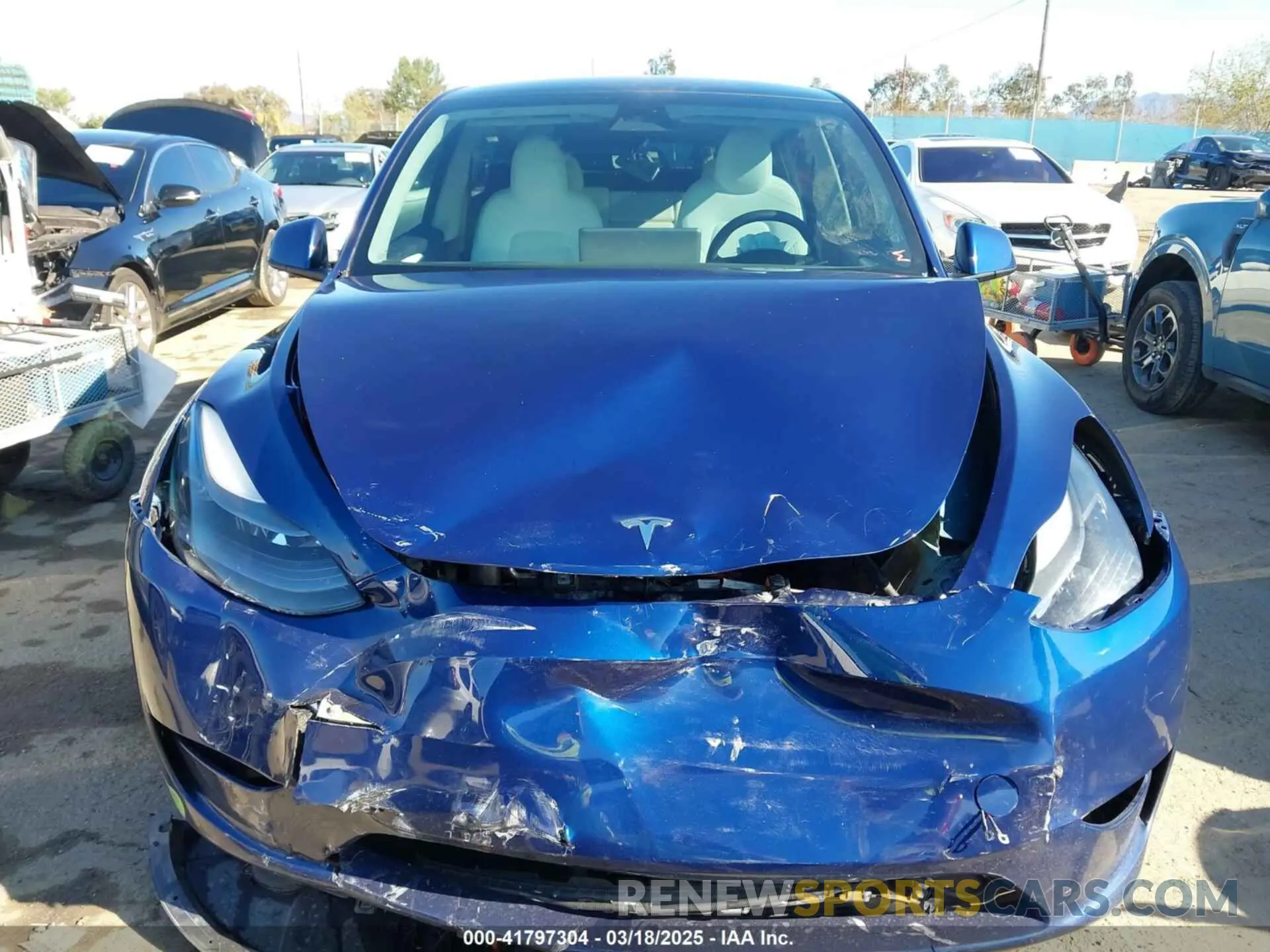 12 Photograph of a damaged car 7SAYGDEE0PF714557 TESLA MODEL Y 2023