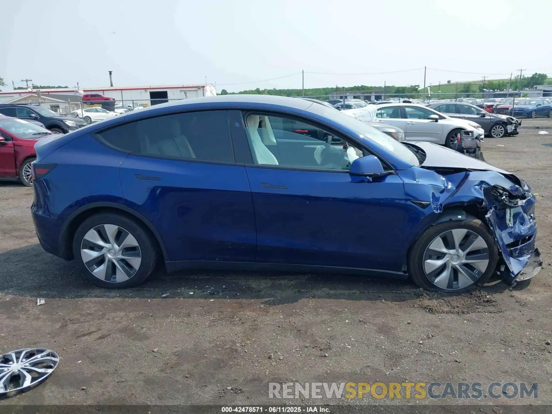 12 Photograph of a damaged car 7SAYGDEE0PF798850 TESLA MODEL Y 2023