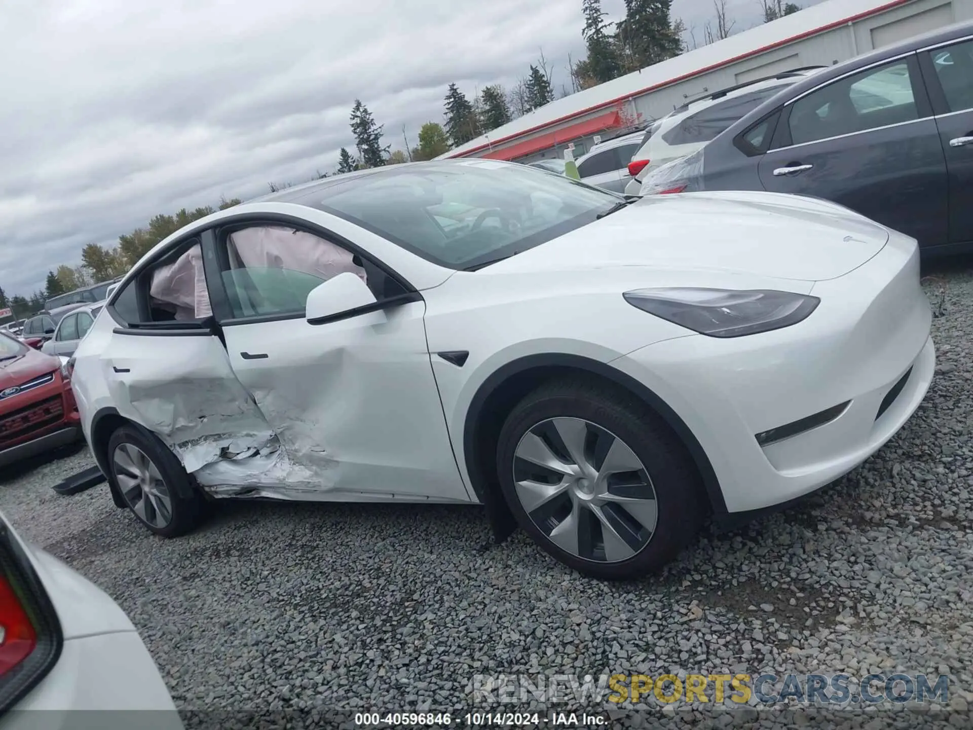14 Photograph of a damaged car 7SAYGDEE0PF814691 TESLA MODEL Y 2023