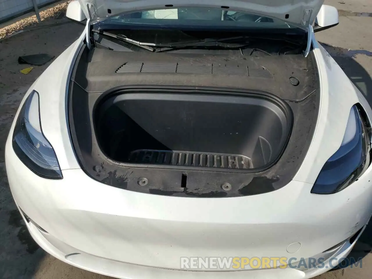 12 Photograph of a damaged car 7SAYGDEE0PF853040 TESLA MODEL Y 2023