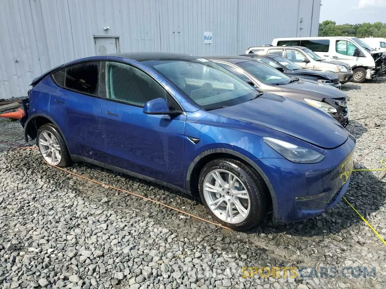 4 Photograph of a damaged car 7SAYGDEE0PF894963 TESLA MODEL Y 2023