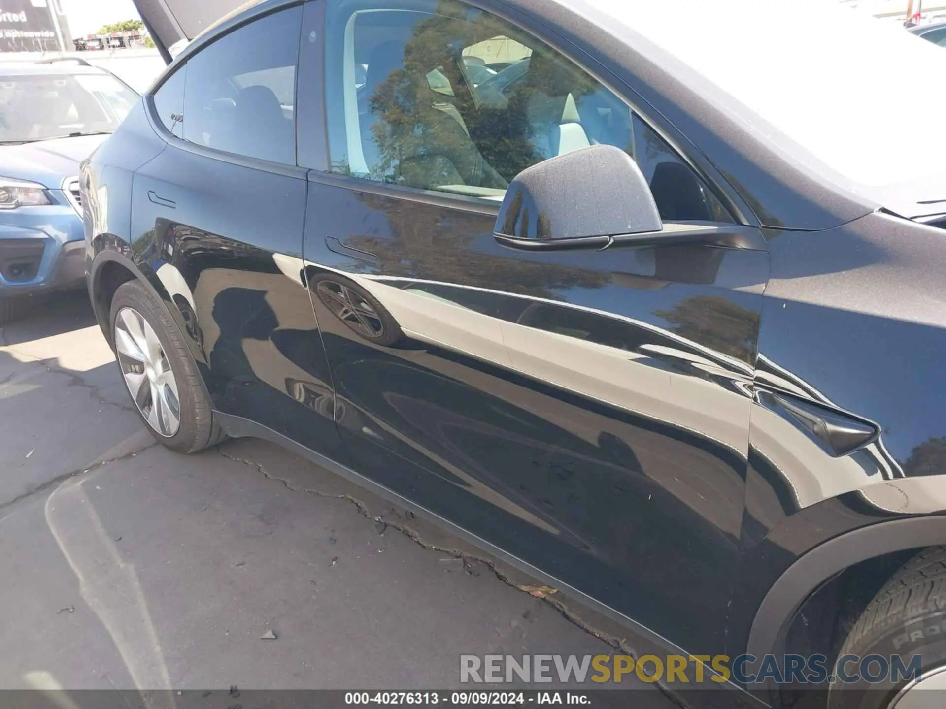 14 Photograph of a damaged car 7SAYGDEE1PA033207 TESLA MODEL Y 2023