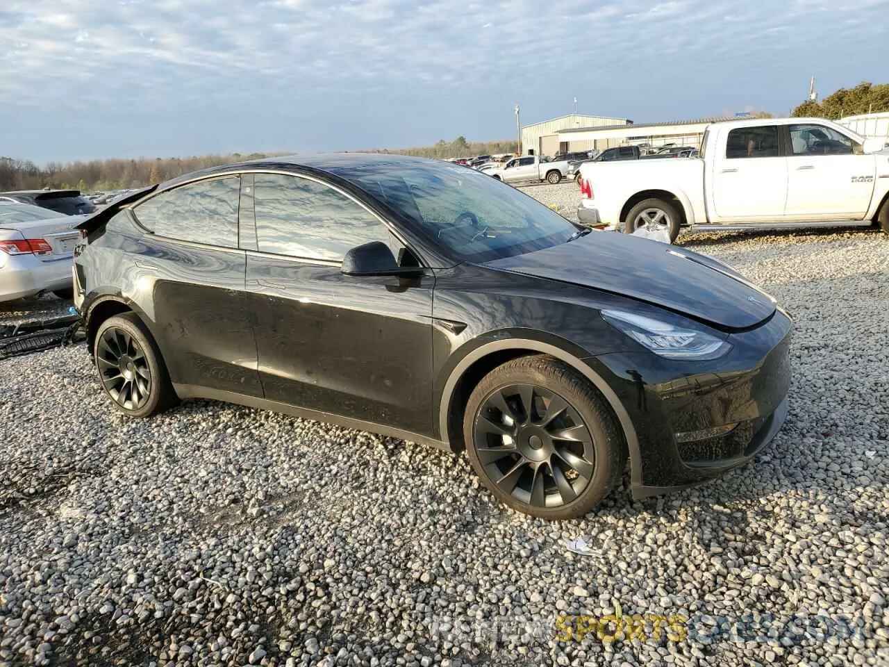 4 Photograph of a damaged car 7SAYGDEE1PA057961 TESLA MODEL Y 2023
