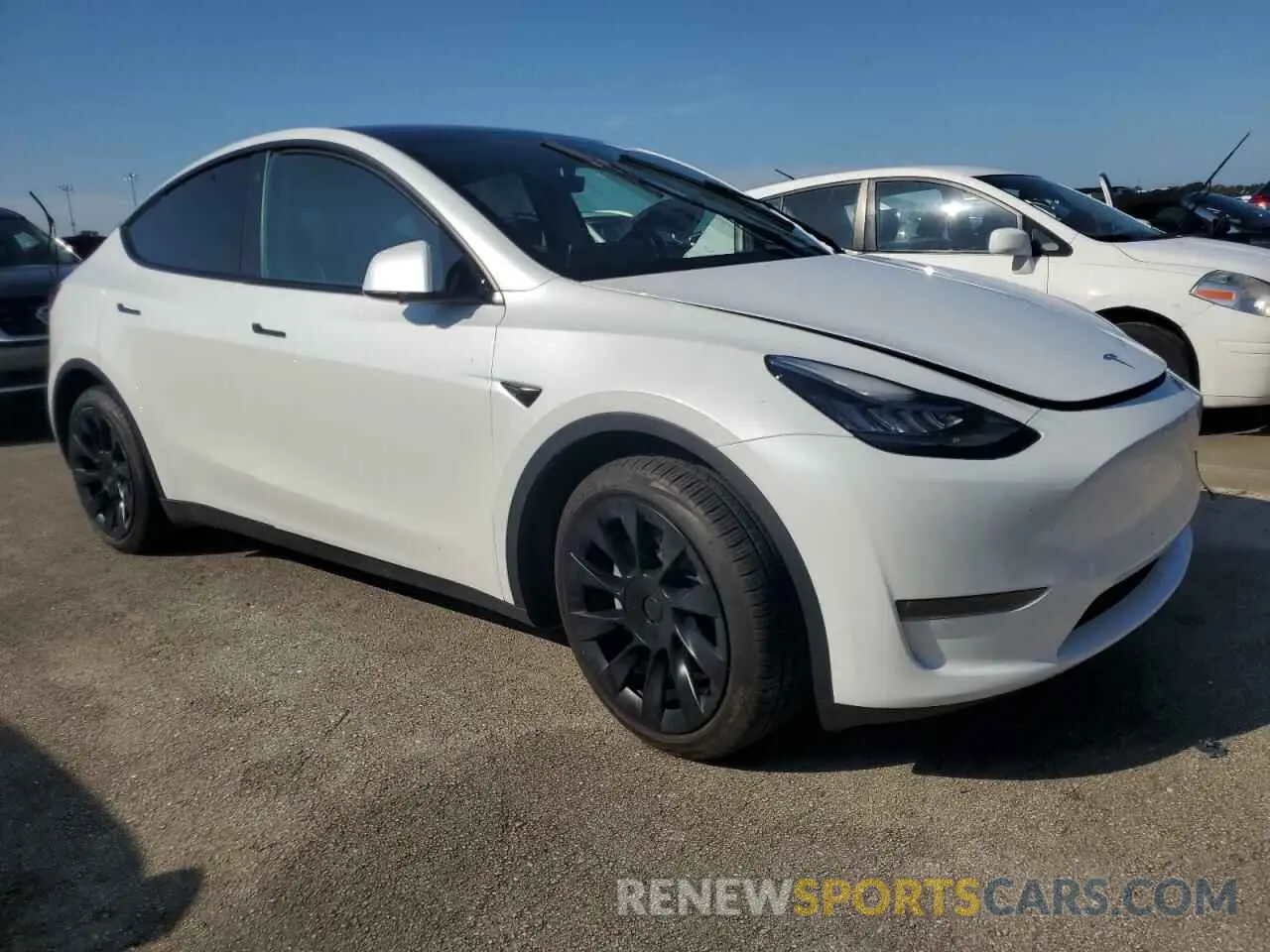4 Photograph of a damaged car 7SAYGDEE1PA060777 TESLA MODEL Y 2023