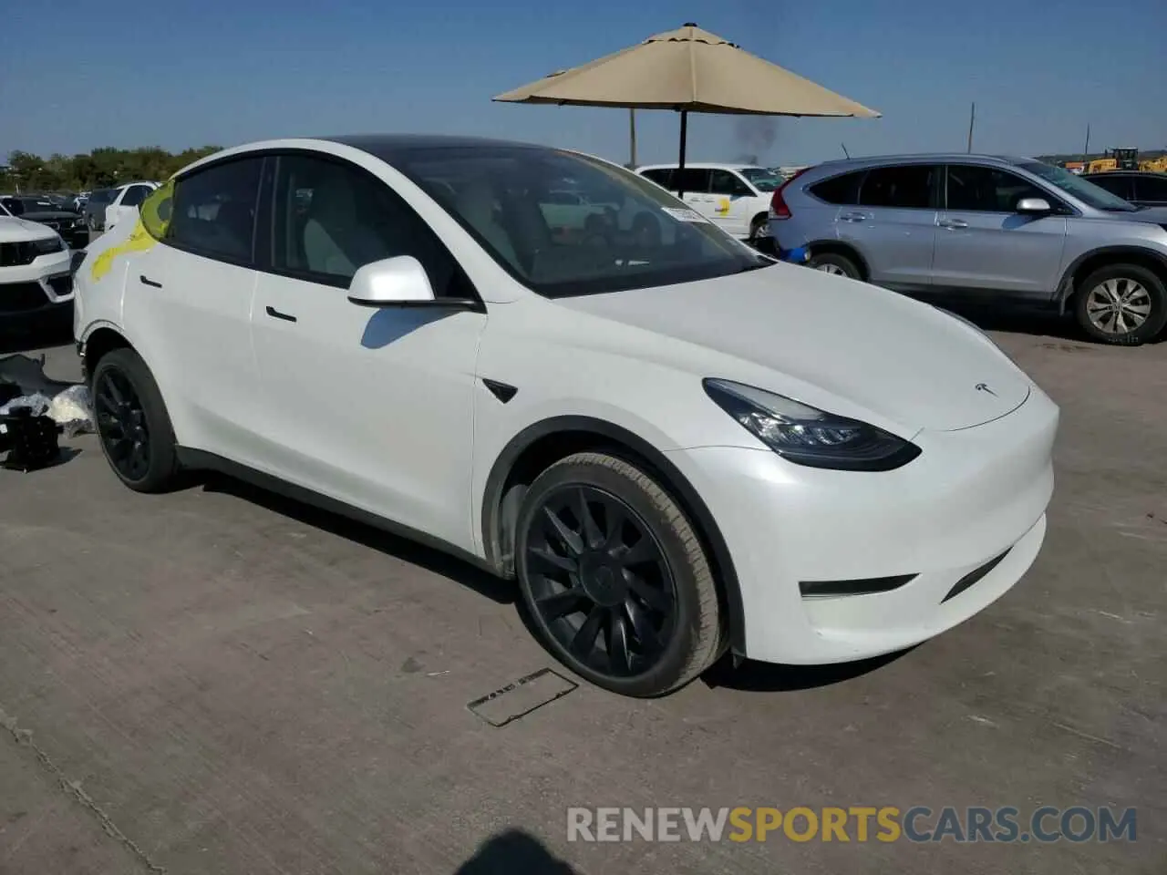 4 Photograph of a damaged car 7SAYGDEE1PA112330 TESLA MODEL Y 2023