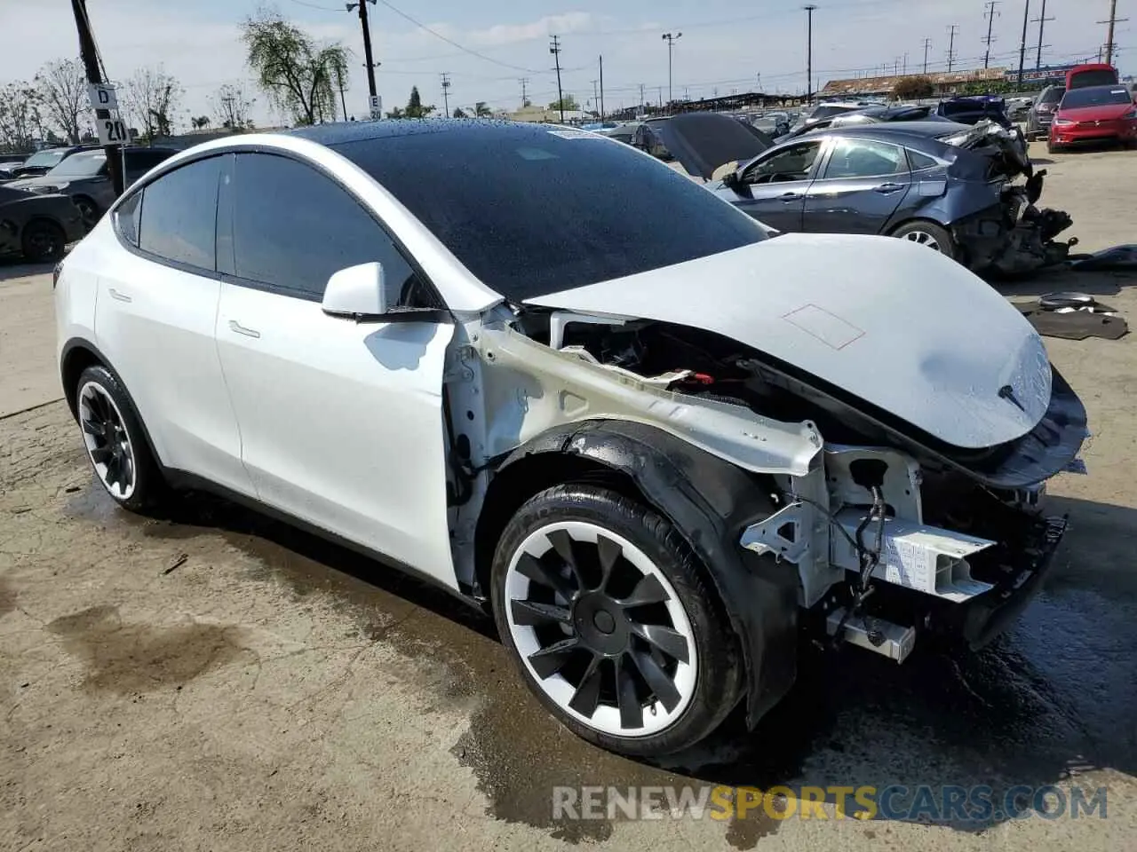 4 Photograph of a damaged car 7SAYGDEE1PA125692 TESLA MODEL Y 2023