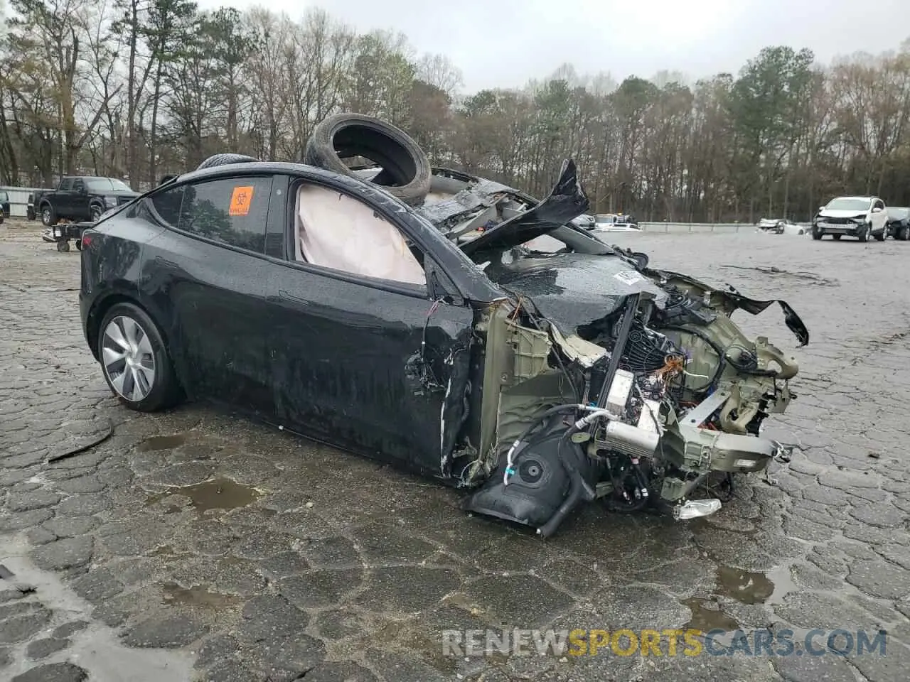4 Photograph of a damaged car 7SAYGDEE1PA127829 TESLA MODEL Y 2023