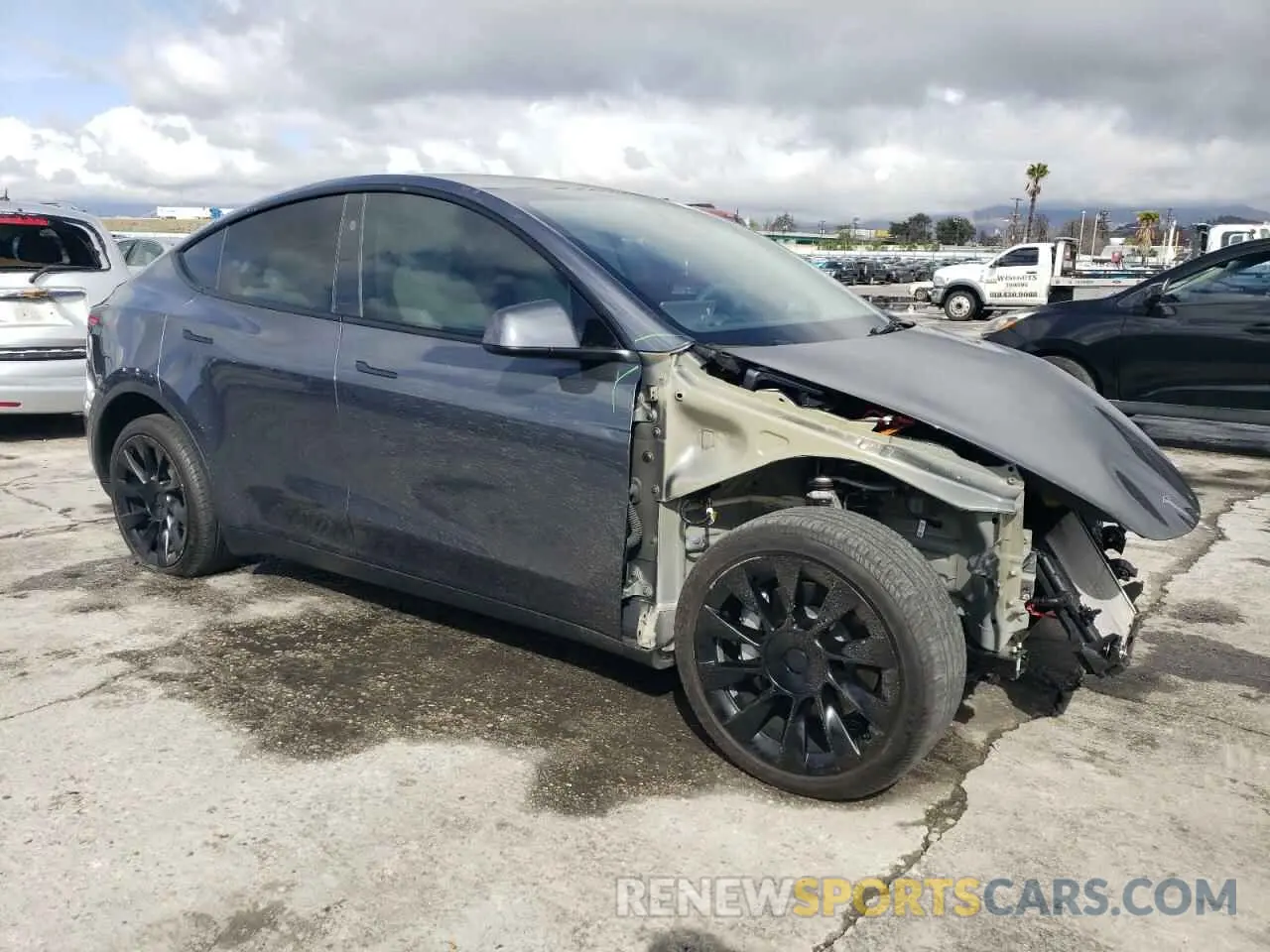 4 Photograph of a damaged car 7SAYGDEE1PA198920 TESLA MODEL Y 2023