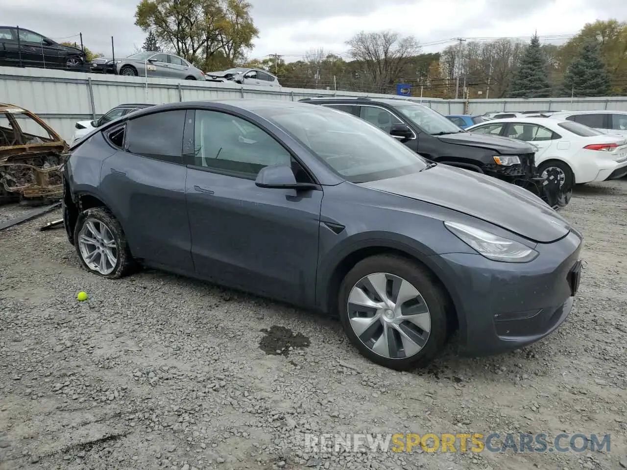 4 Photograph of a damaged car 7SAYGDEE1PF614001 TESLA MODEL Y 2023