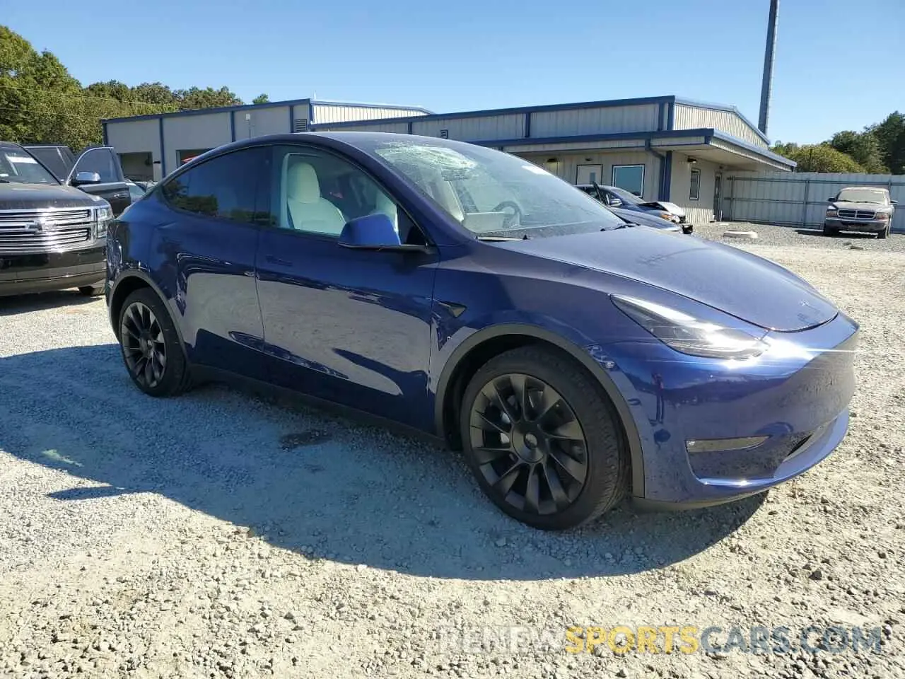 4 Photograph of a damaged car 7SAYGDEE1PF758373 TESLA MODEL Y 2023