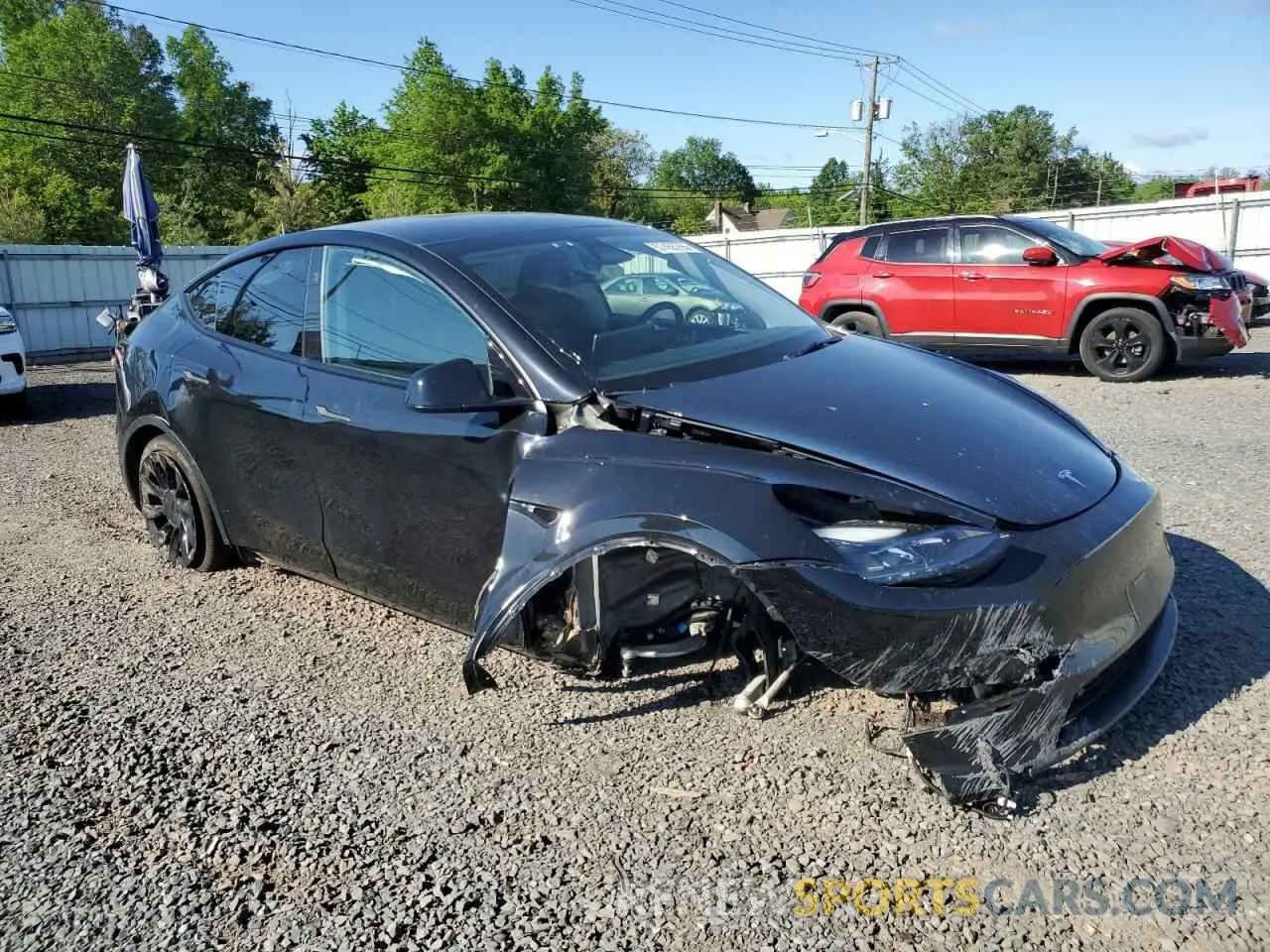 4 Photograph of a damaged car 7SAYGDEE1PF865195 TESLA MODEL Y 2023