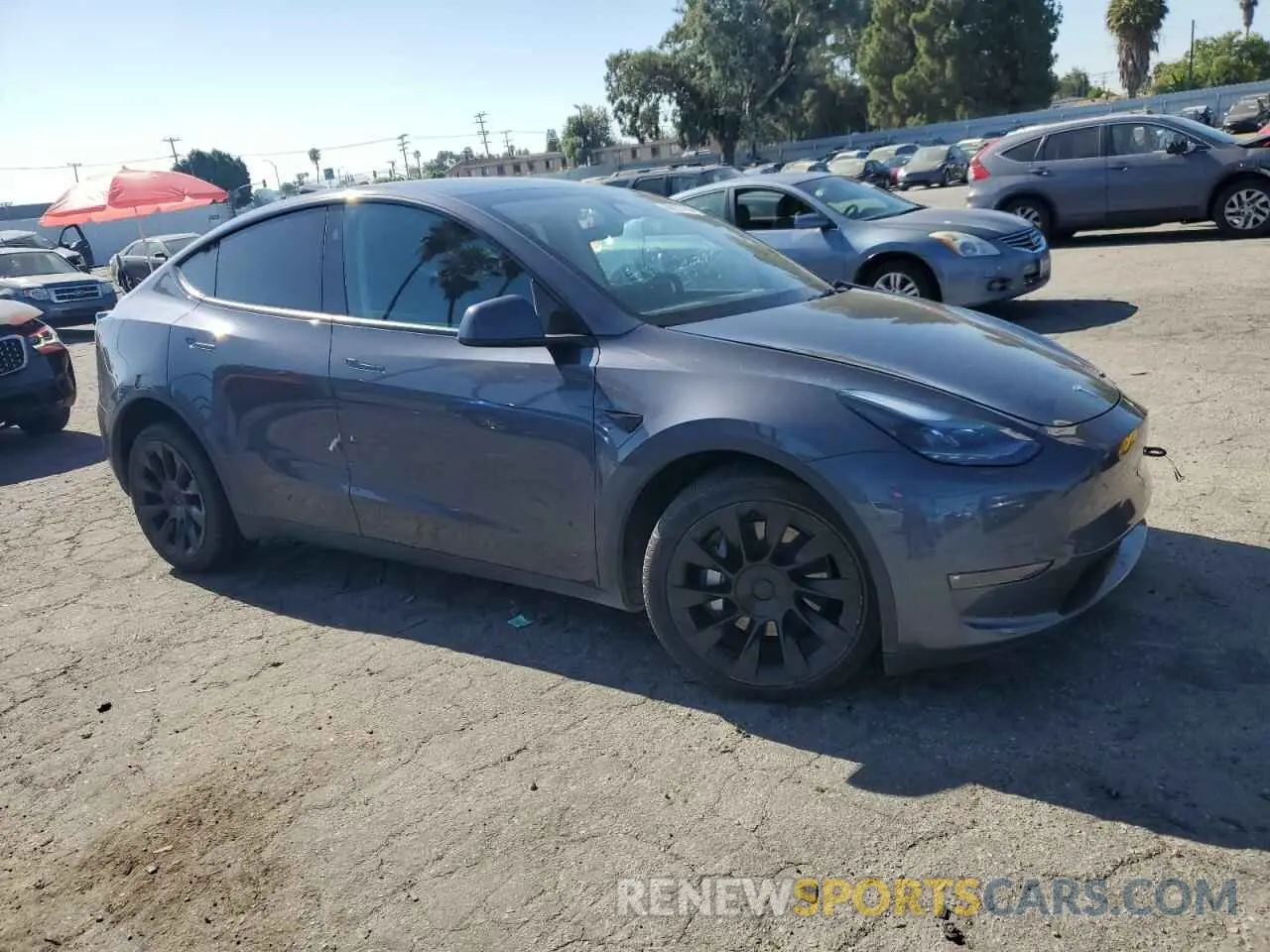4 Photograph of a damaged car 7SAYGDEE1PF918431 TESLA MODEL Y 2023
