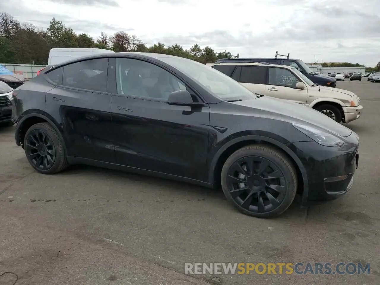 4 Photograph of a damaged car 7SAYGDEE2PA181415 TESLA MODEL Y 2023