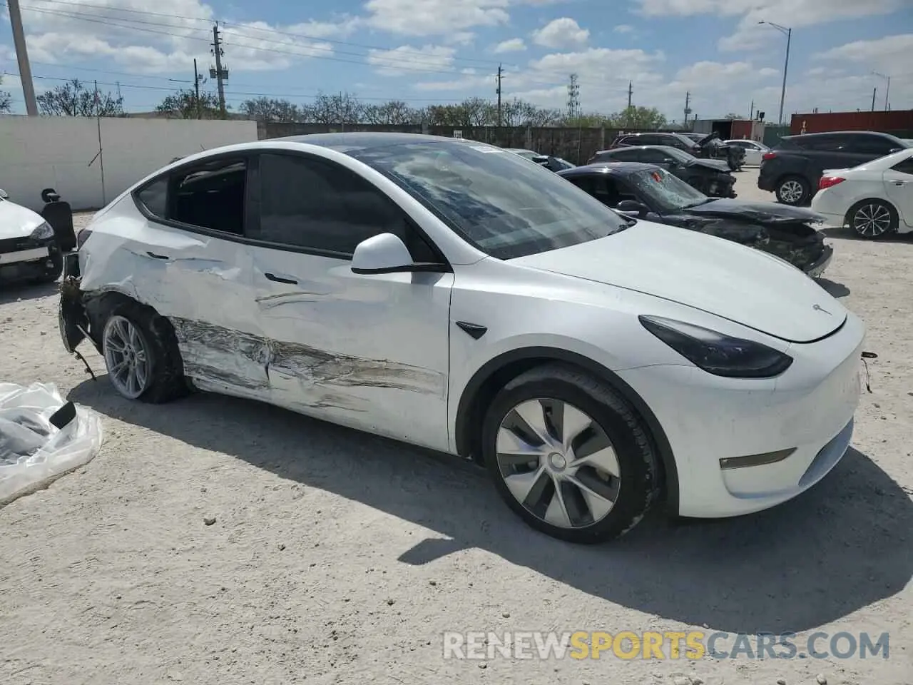 4 Photograph of a damaged car 7SAYGDEE2PF604318 TESLA MODEL Y 2023