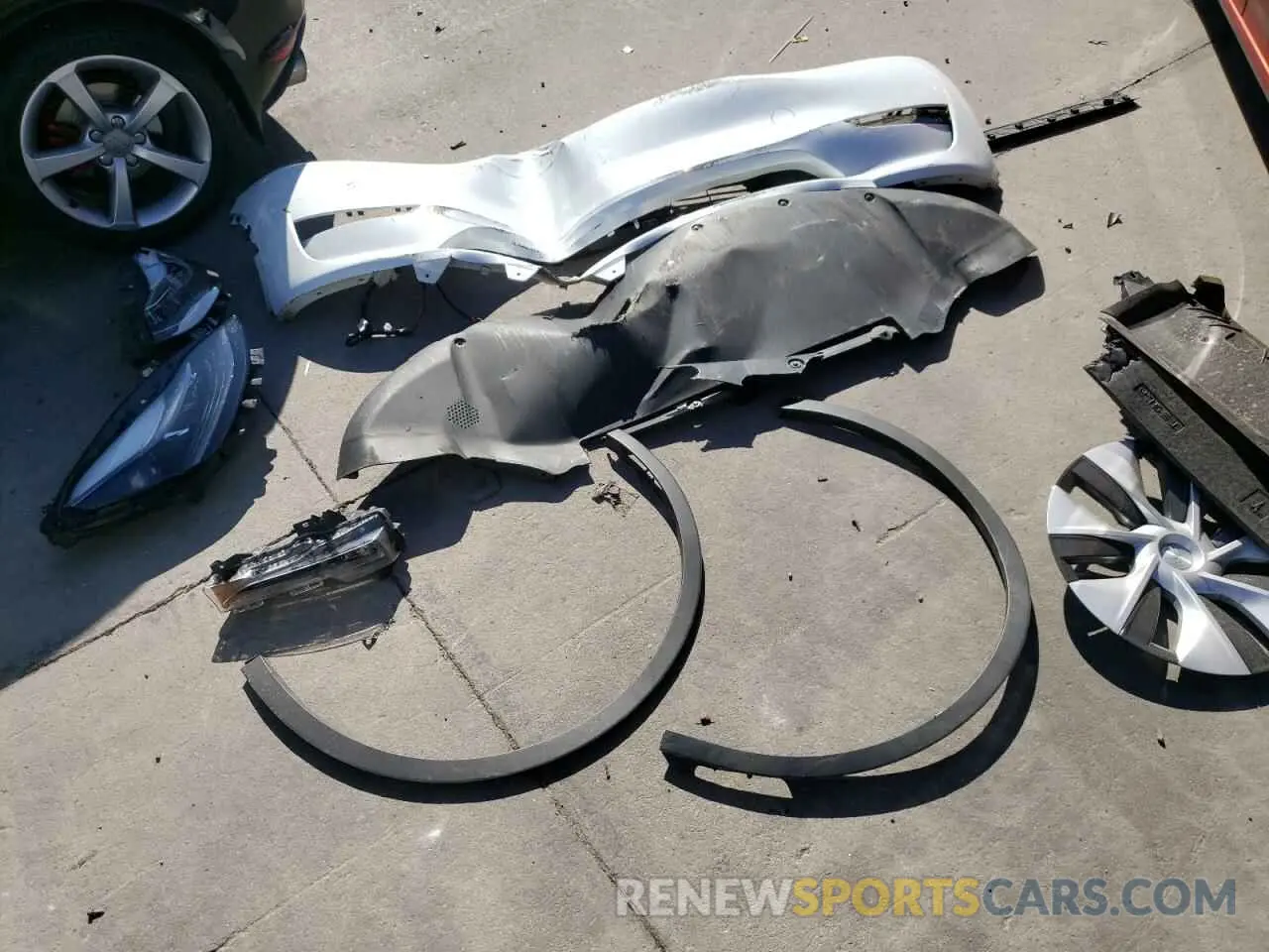12 Photograph of a damaged car 7SAYGDEE2PF703494 TESLA MODEL Y 2023