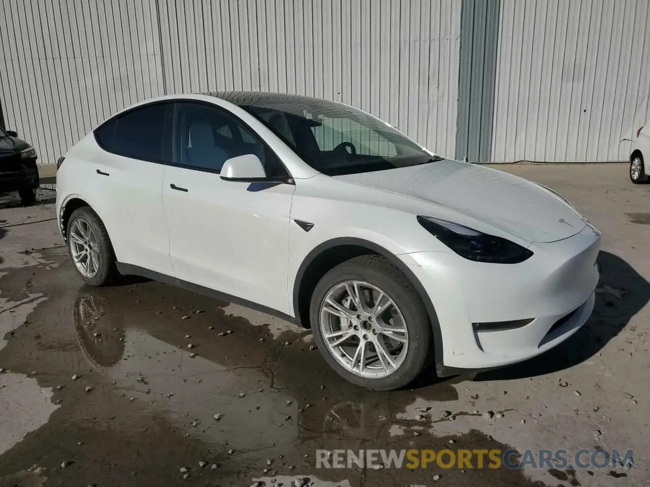4 Photograph of a damaged car 7SAYGDEE2PF711689 TESLA MODEL Y 2023