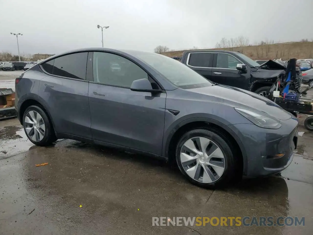 4 Photograph of a damaged car 7SAYGDEE2PF887772 TESLA MODEL Y 2023