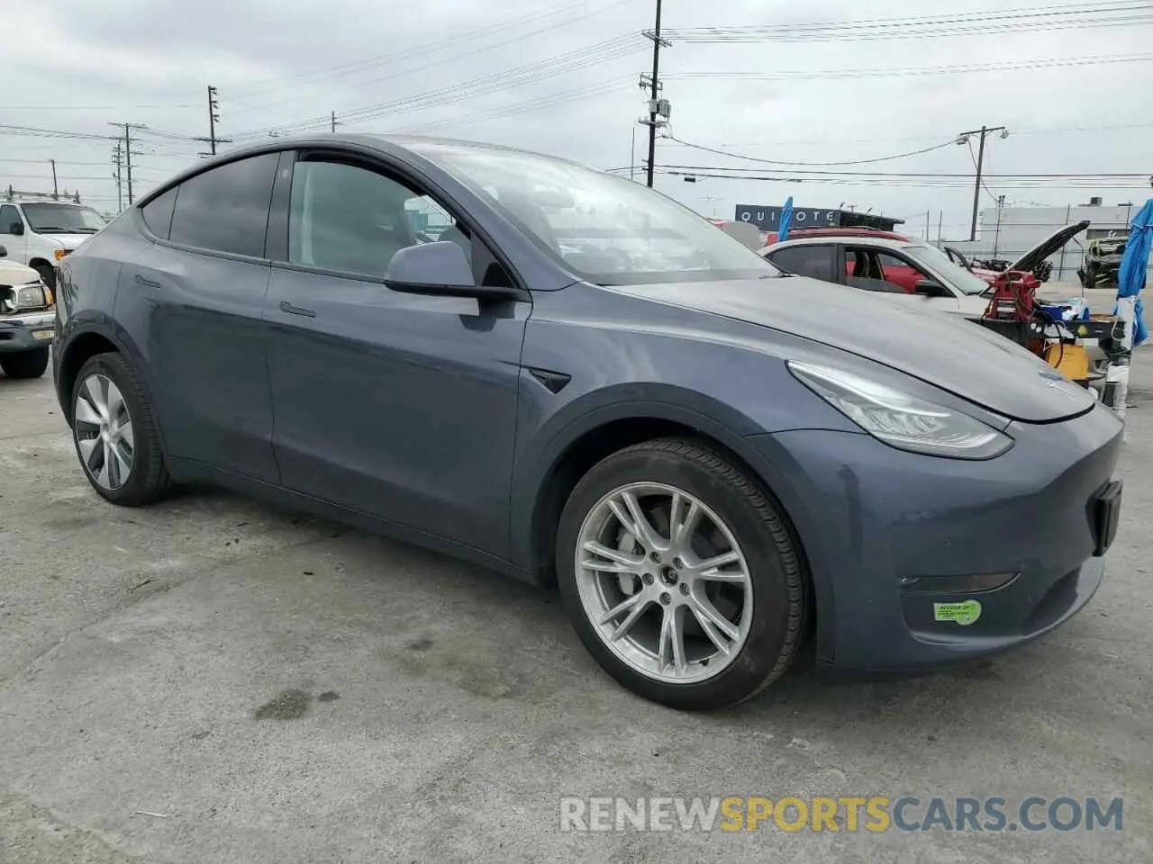 4 Photograph of a damaged car 7SAYGDEE3PA069786 TESLA MODEL Y 2023