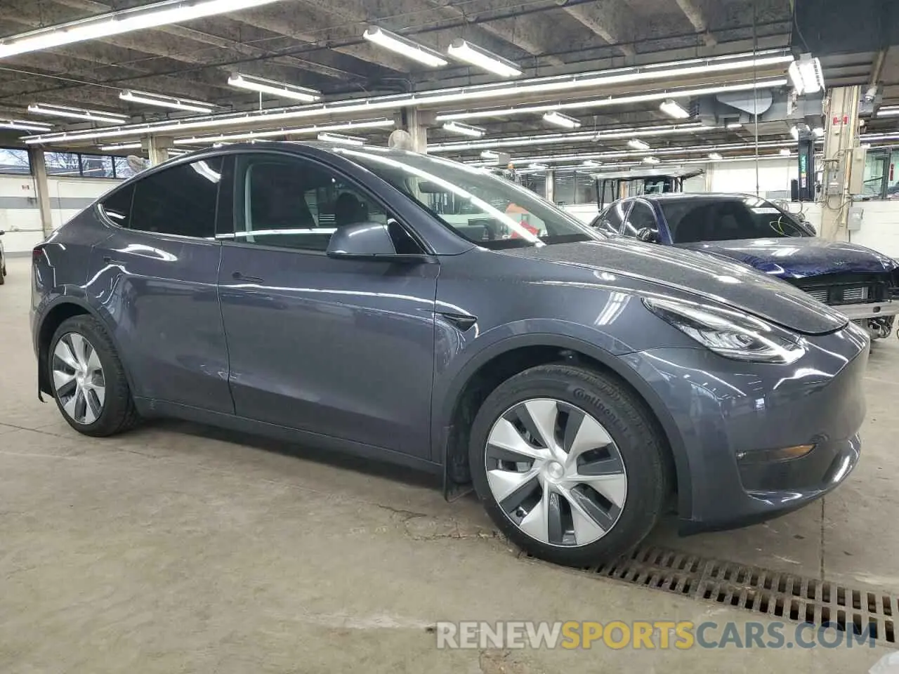4 Photograph of a damaged car 7SAYGDEE3PF611665 TESLA MODEL Y 2023