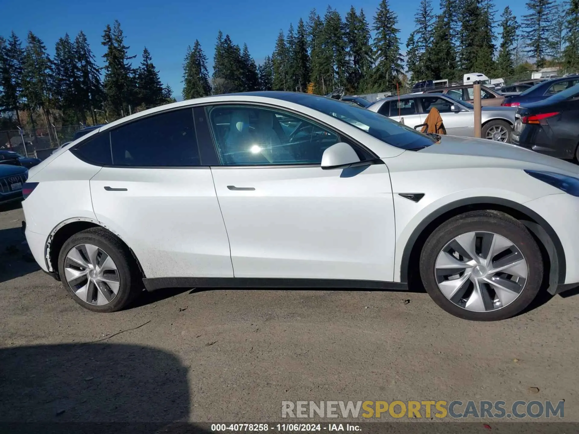 14 Photograph of a damaged car 7SAYGDEE3PF635688 TESLA MODEL Y 2023
