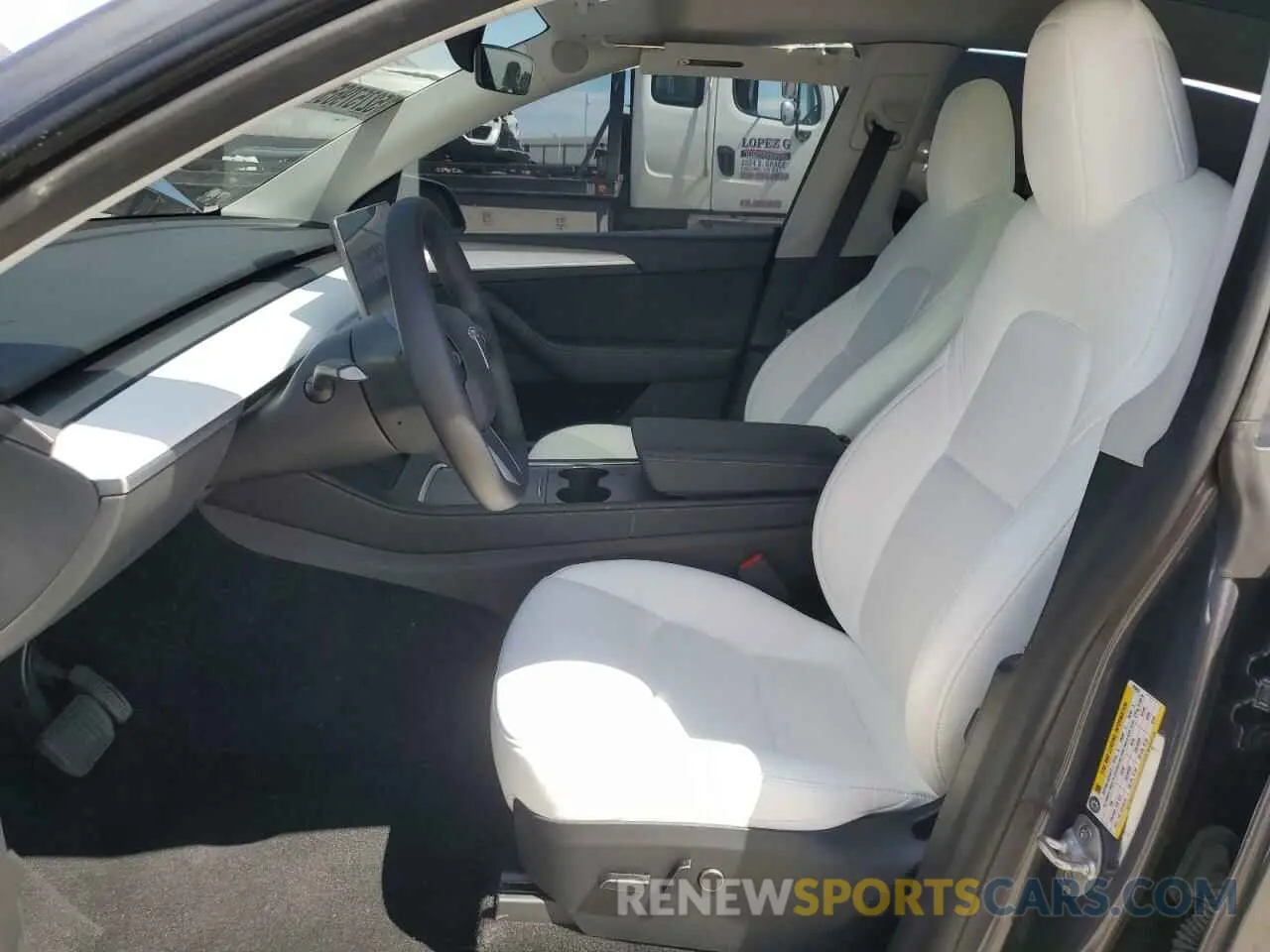 7 Photograph of a damaged car 7SAYGDEE3PF910413 TESLA MODEL Y 2023