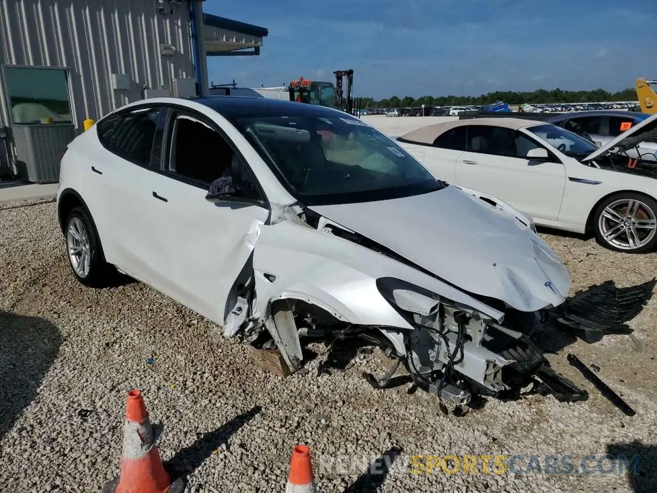 4 Photograph of a damaged car 7SAYGDEE4PA040507 TESLA MODEL Y 2023