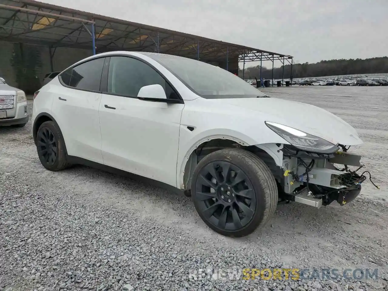 4 Photograph of a damaged car 7SAYGDEE4PA059512 TESLA MODEL Y 2023