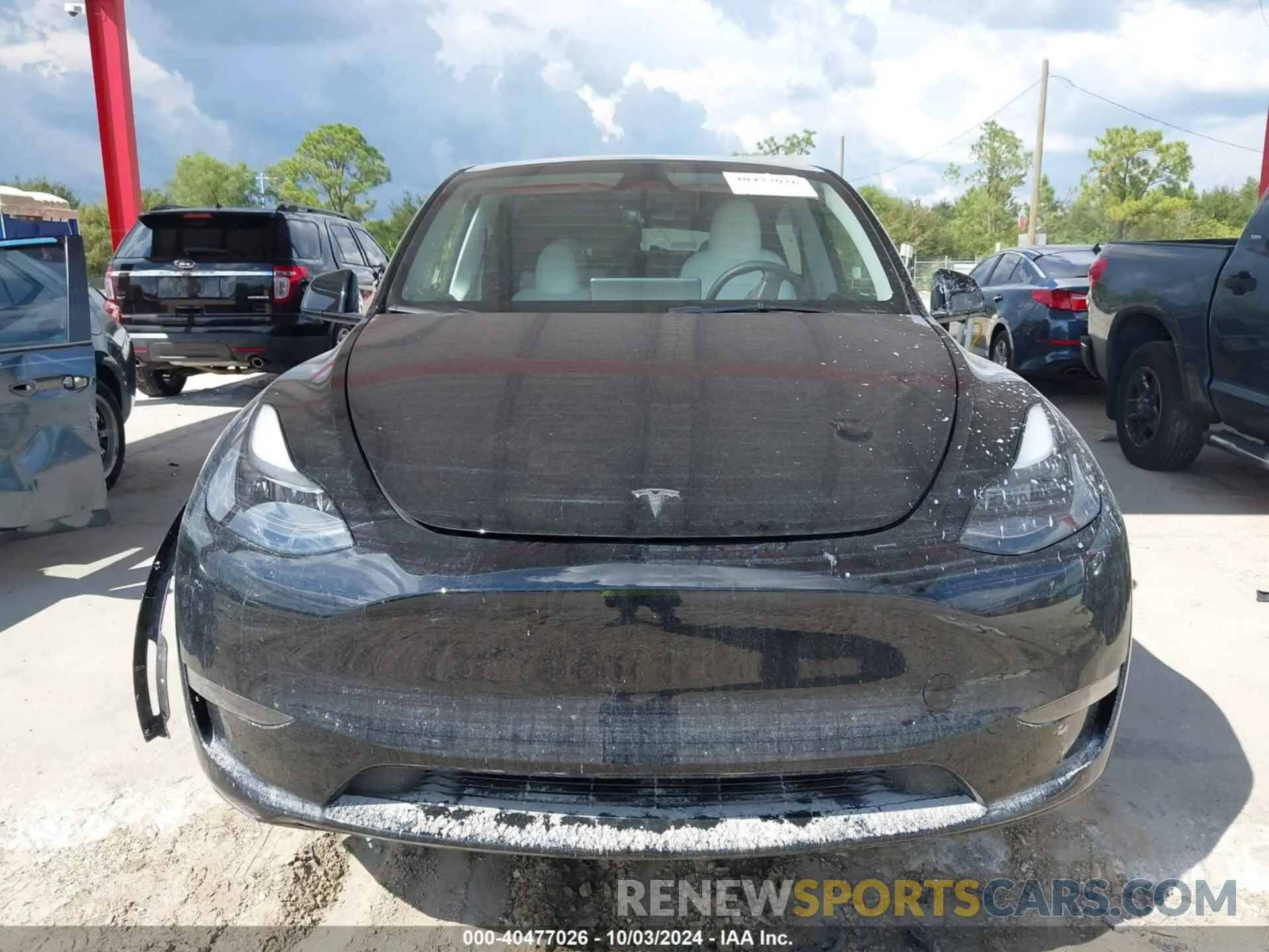 12 Photograph of a damaged car 7SAYGDEE4PF858340 TESLA MODEL Y 2023