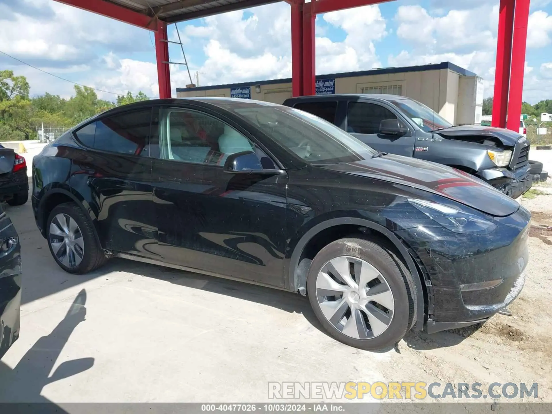 13 Photograph of a damaged car 7SAYGDEE4PF858340 TESLA MODEL Y 2023