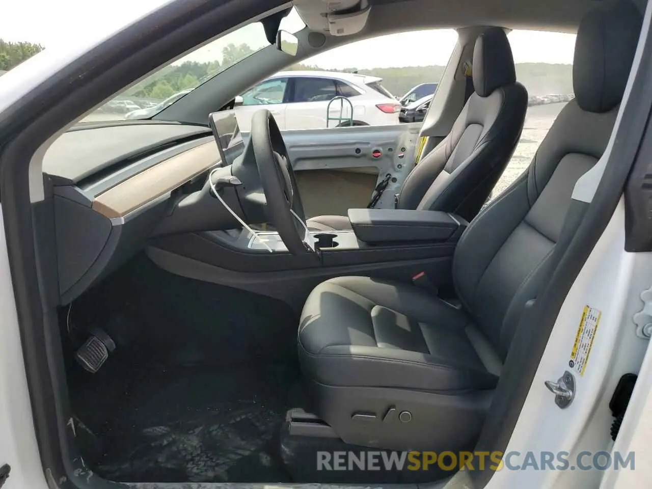 7 Photograph of a damaged car 7SAYGDEE5PA100522 TESLA MODEL Y 2023