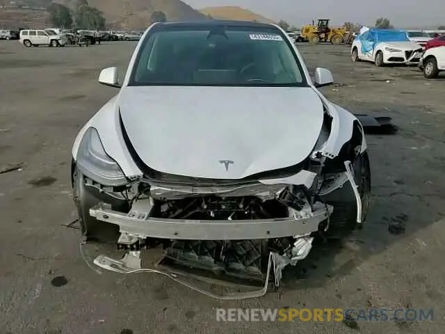 11 Photograph of a damaged car 7SAYGDEE5PA125887 TESLA MODEL Y 2023