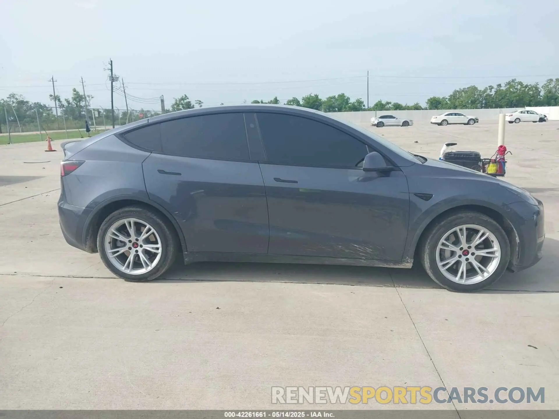 12 Photograph of a damaged car 7SAYGDEE5PA170506 TESLA MODEL Y 2023
