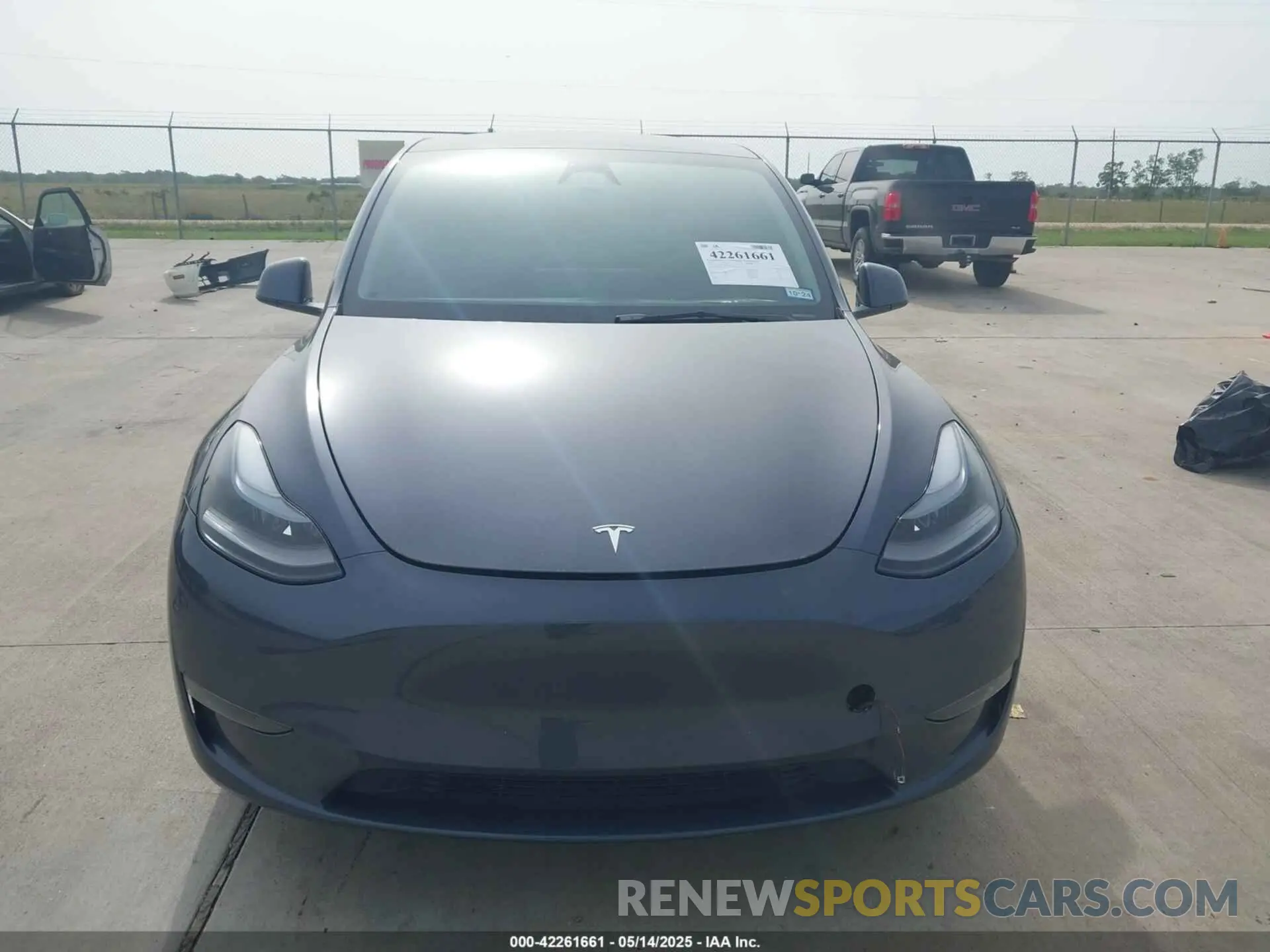 6 Photograph of a damaged car 7SAYGDEE5PA170506 TESLA MODEL Y 2023