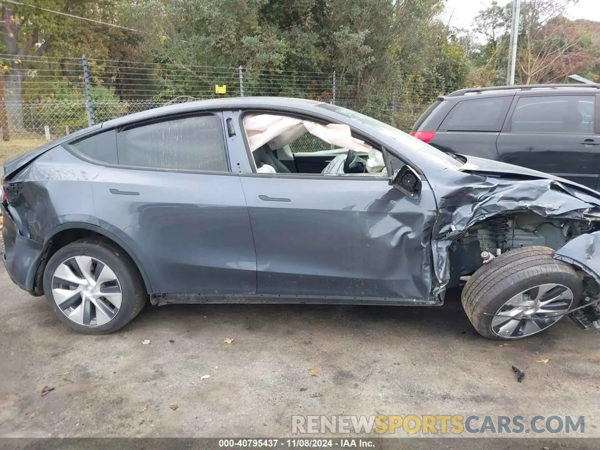 12 Photograph of a damaged car 7SAYGDEE5PF675299 TESLA MODEL Y 2023