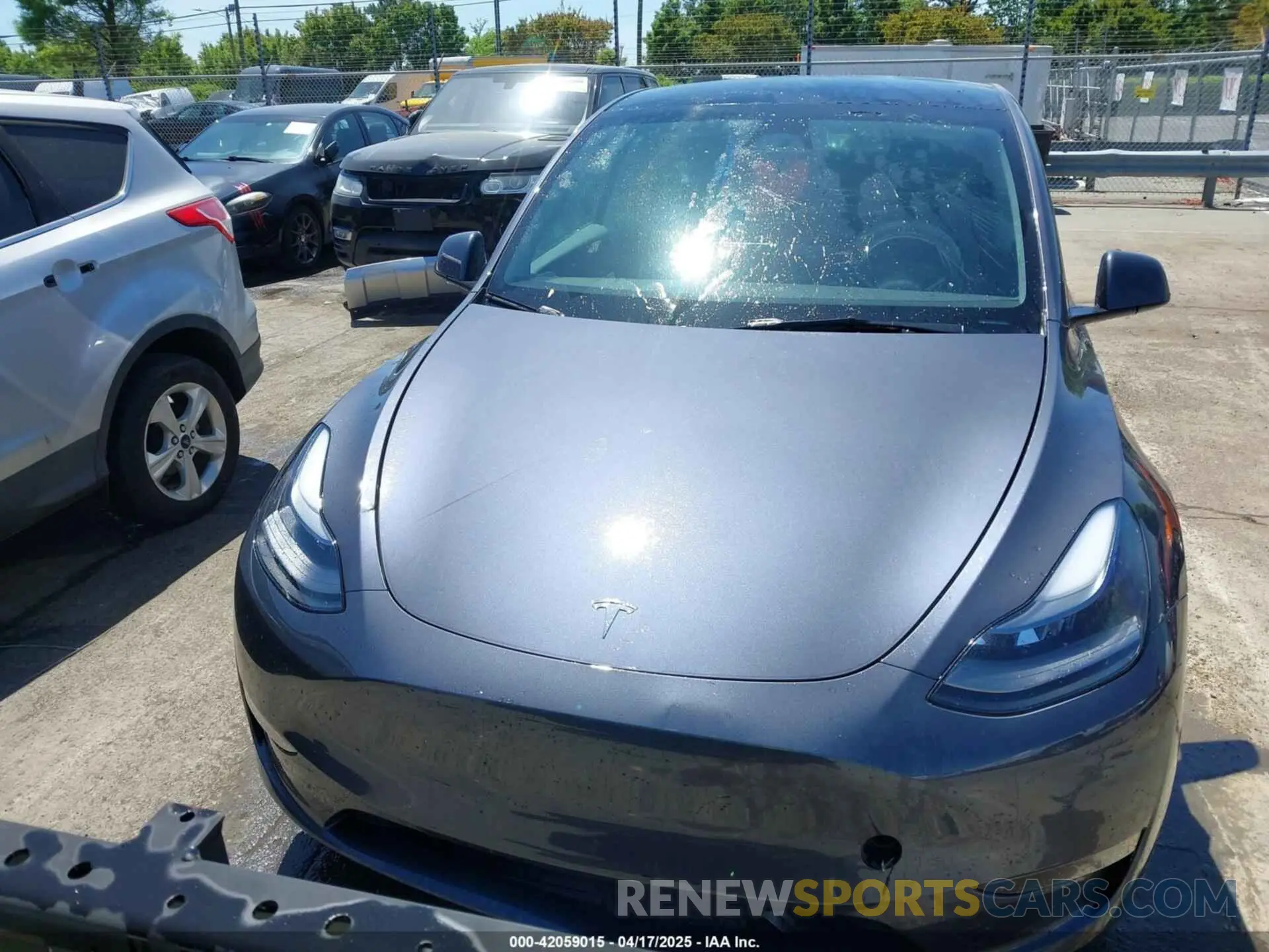 12 Photograph of a damaged car 7SAYGDEE5PF882582 TESLA MODEL Y 2023