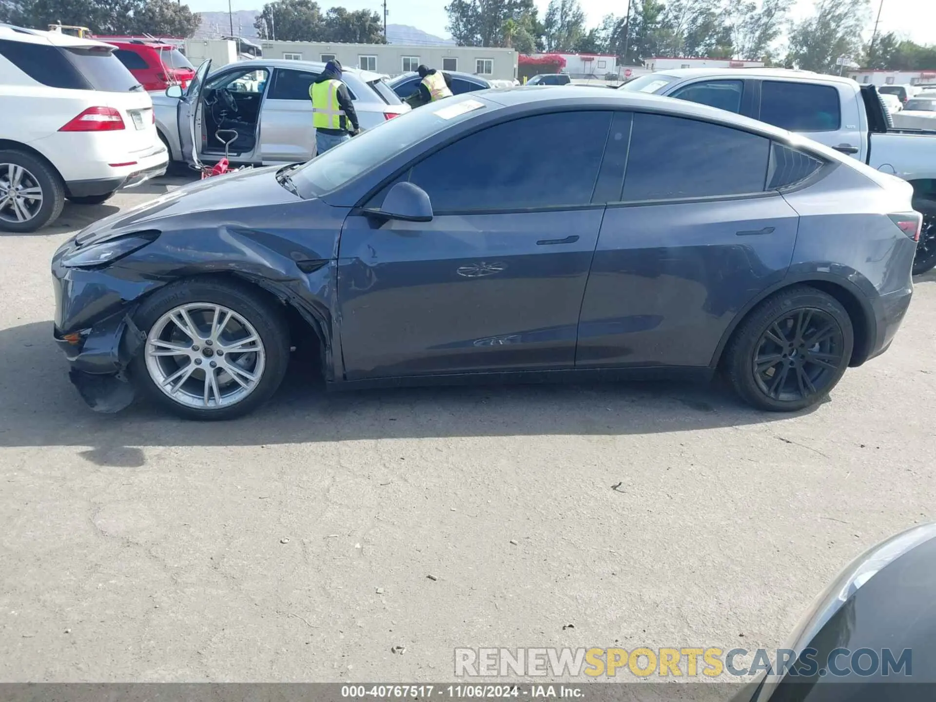 14 Photograph of a damaged car 7SAYGDEE5PF909067 TESLA MODEL Y 2023