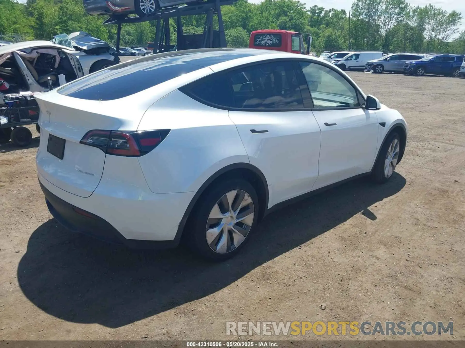 4 Photograph of a damaged car 7SAYGDEE6PA080118 TESLA MODEL Y 2023