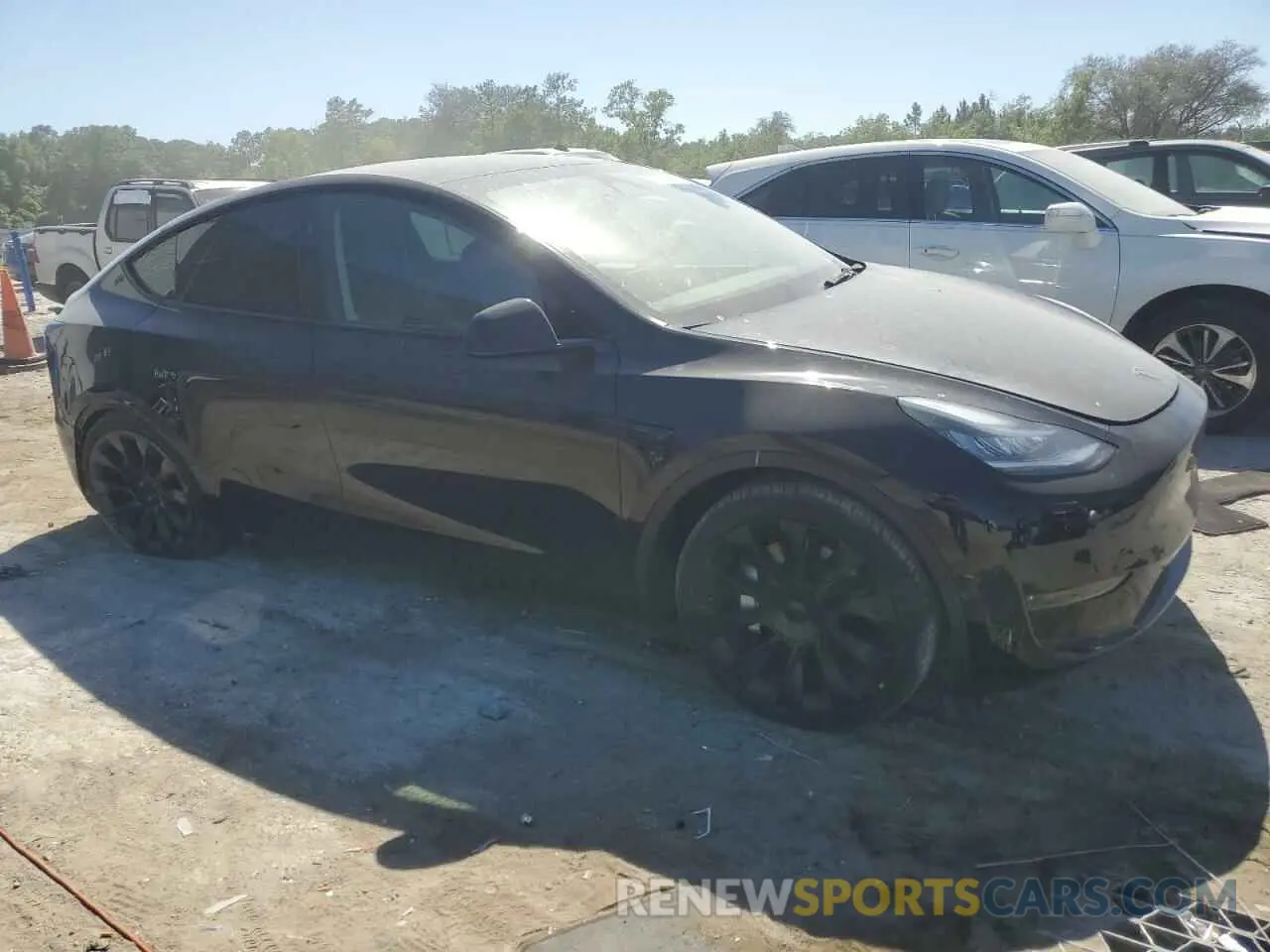4 Photograph of a damaged car 7SAYGDEE6PA154153 TESLA MODEL Y 2023