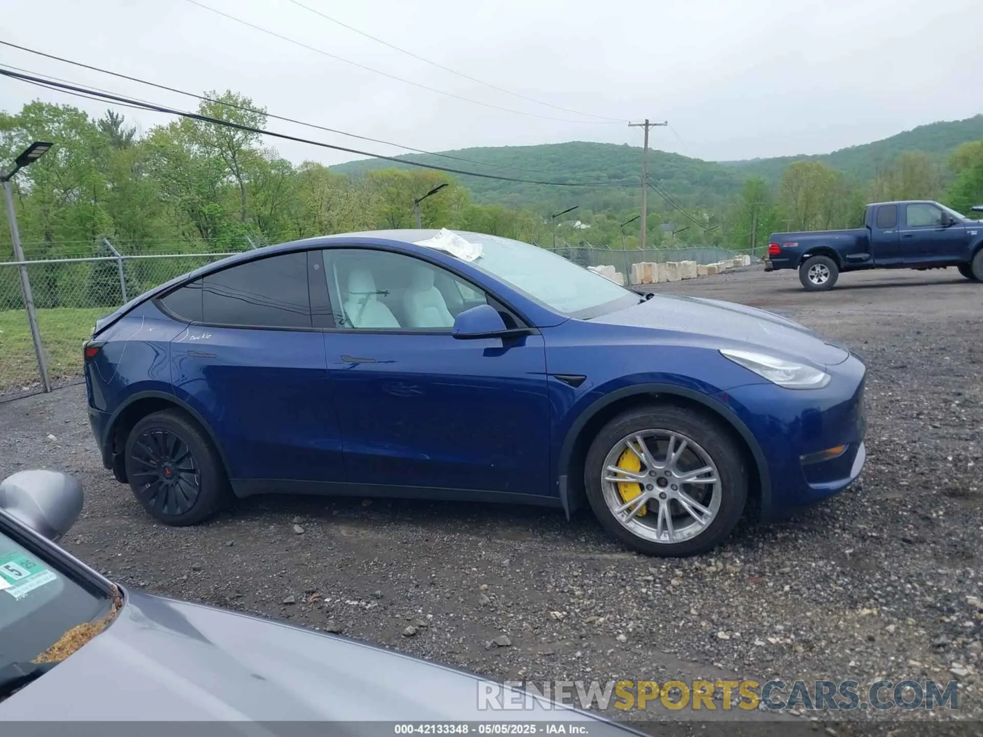 14 Photograph of a damaged car 7SAYGDEE6PF603981 TESLA MODEL Y 2023