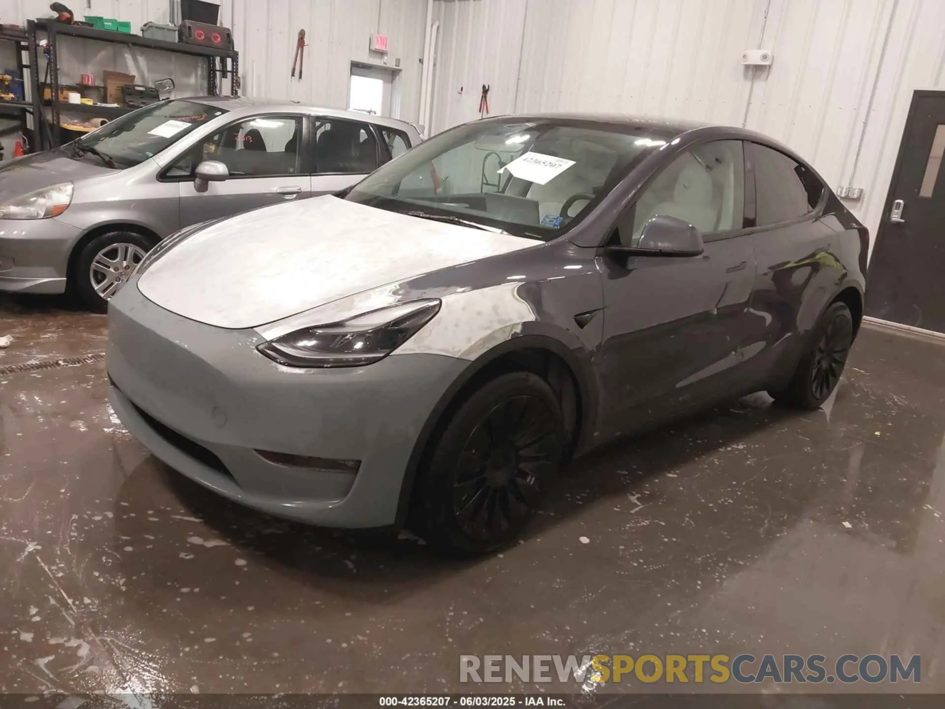 2 Photograph of a damaged car 7SAYGDEE6PF810984 TESLA MODEL Y 2023