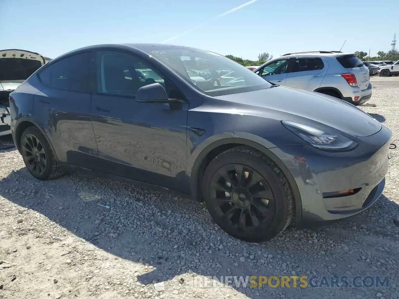 4 Photograph of a damaged car 7SAYGDEE7PA025631 TESLA MODEL Y 2023