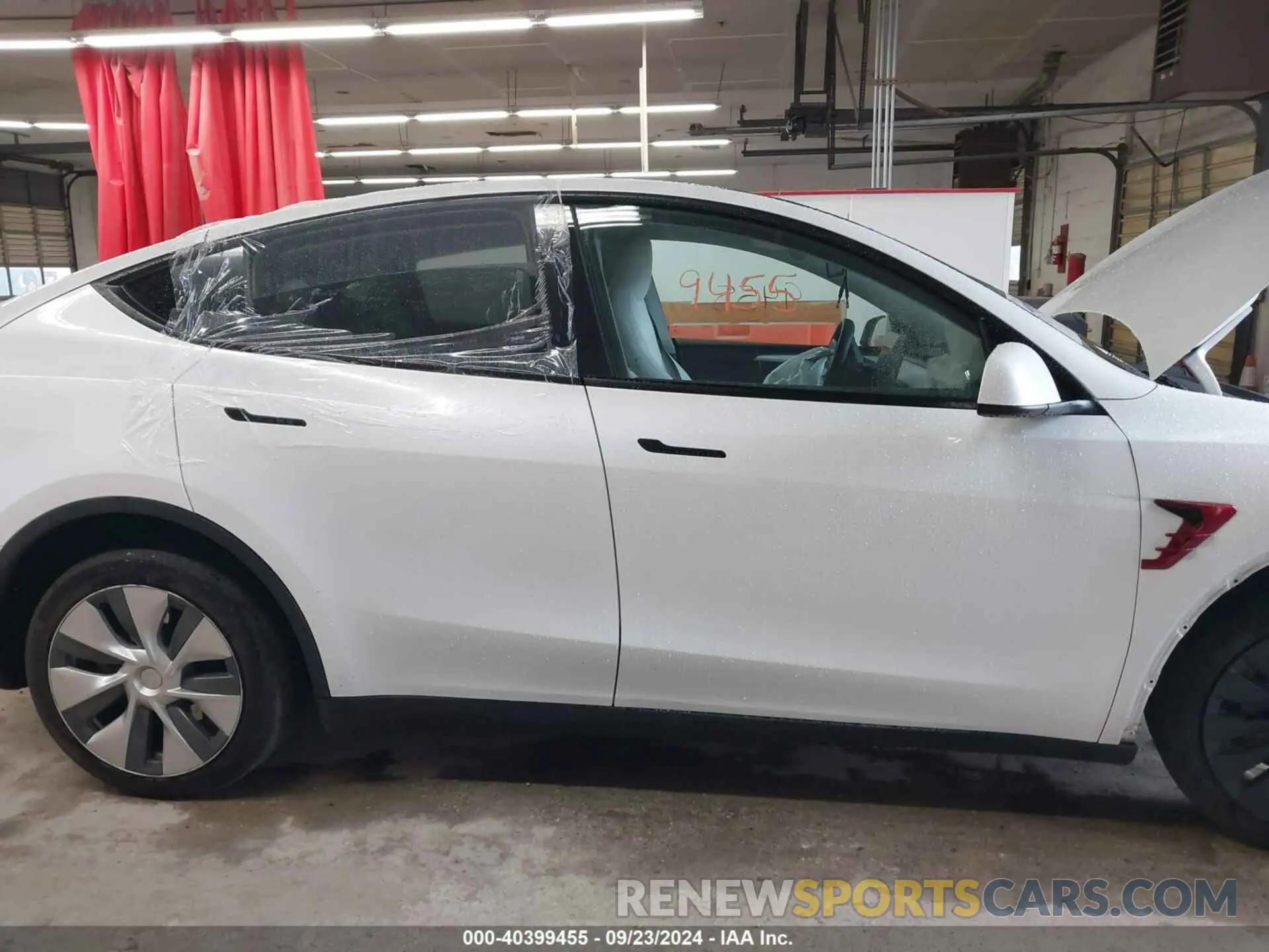 13 Photograph of a damaged car 7SAYGDEE7PA100523 TESLA MODEL Y 2023