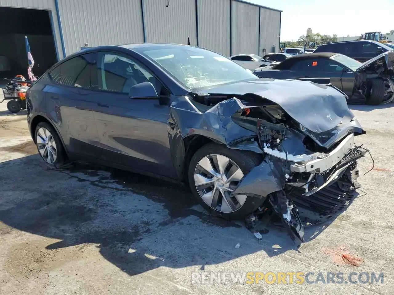 4 Photograph of a damaged car 7SAYGDEE7PA131500 TESLA MODEL Y 2023