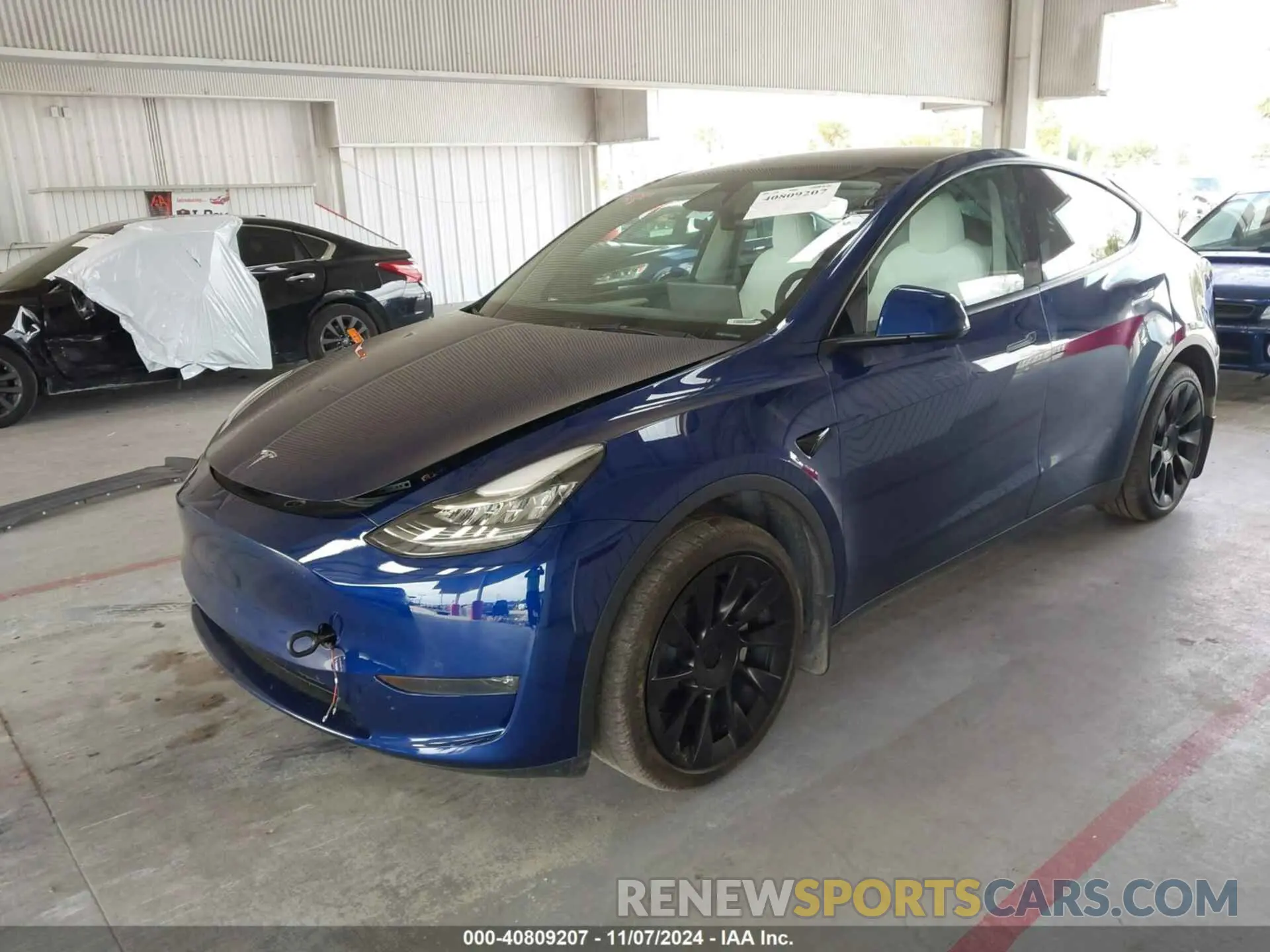 2 Photograph of a damaged car 7SAYGDEE7PA143890 TESLA MODEL Y 2023