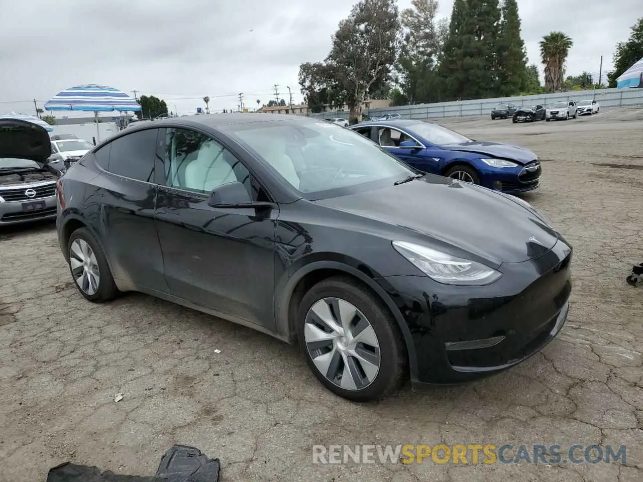 4 Photograph of a damaged car 7SAYGDEE7PA155411 TESLA MODEL Y 2023