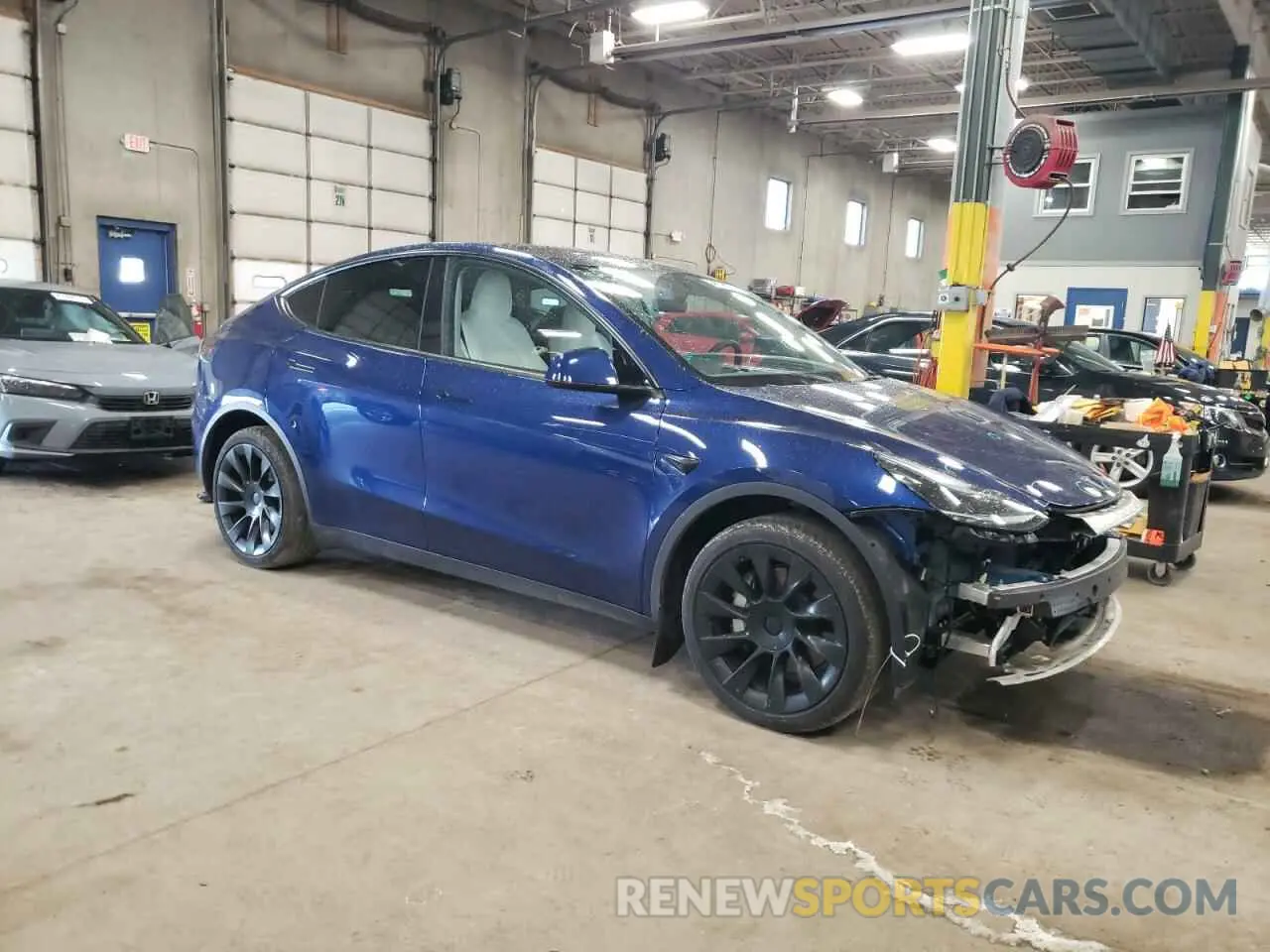 4 Photograph of a damaged car 7SAYGDEE7PA180793 TESLA MODEL Y 2023